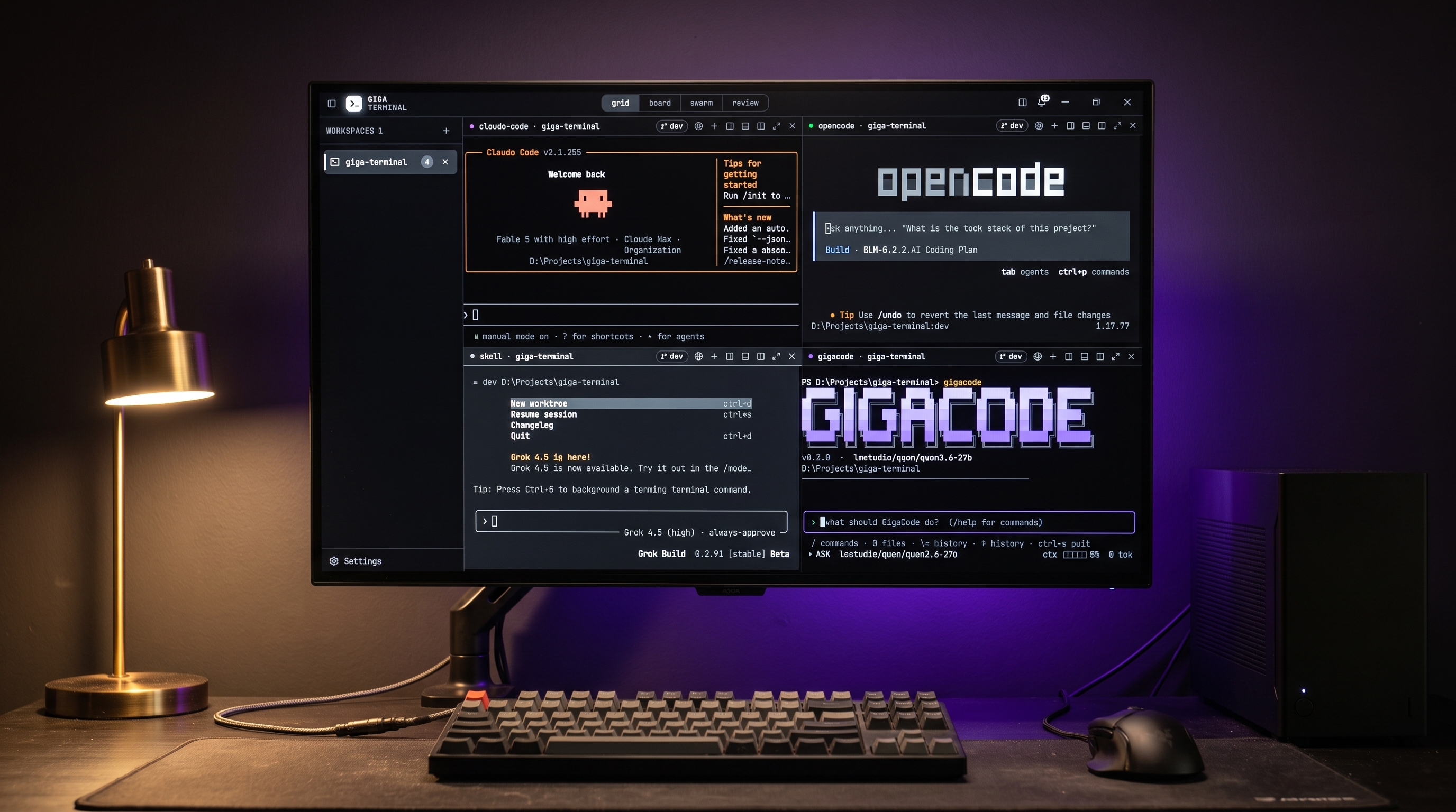 GigaGrid running Claude Code, opencode, a shell, and GigaCode in four panes on a flat monitor, warm desk lamp to the left