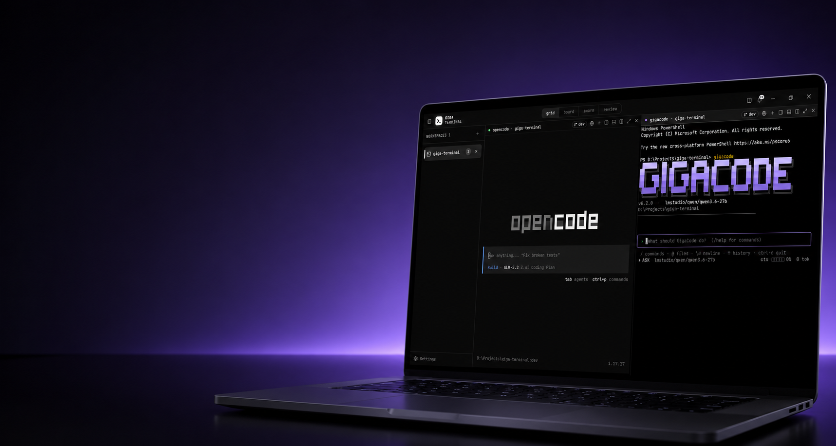 A laptop running Giga Terminal in a dark purple-lit room